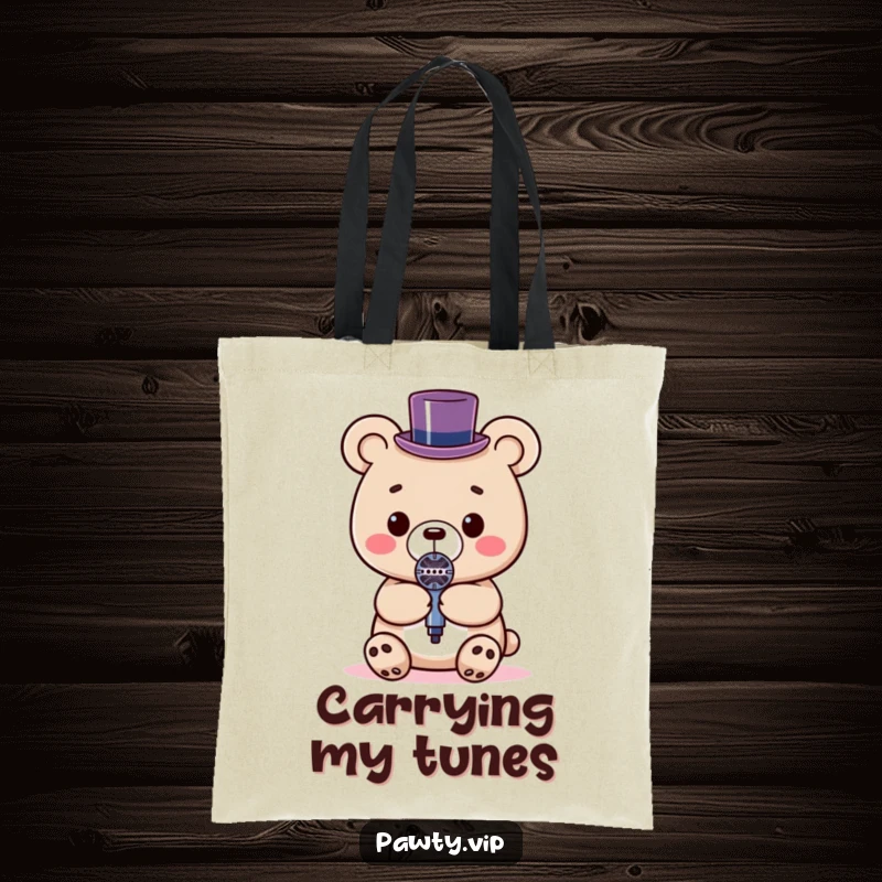 Funny Kawaii bear in a top hat holding a microphone on a tote bag, great for carrying gear.