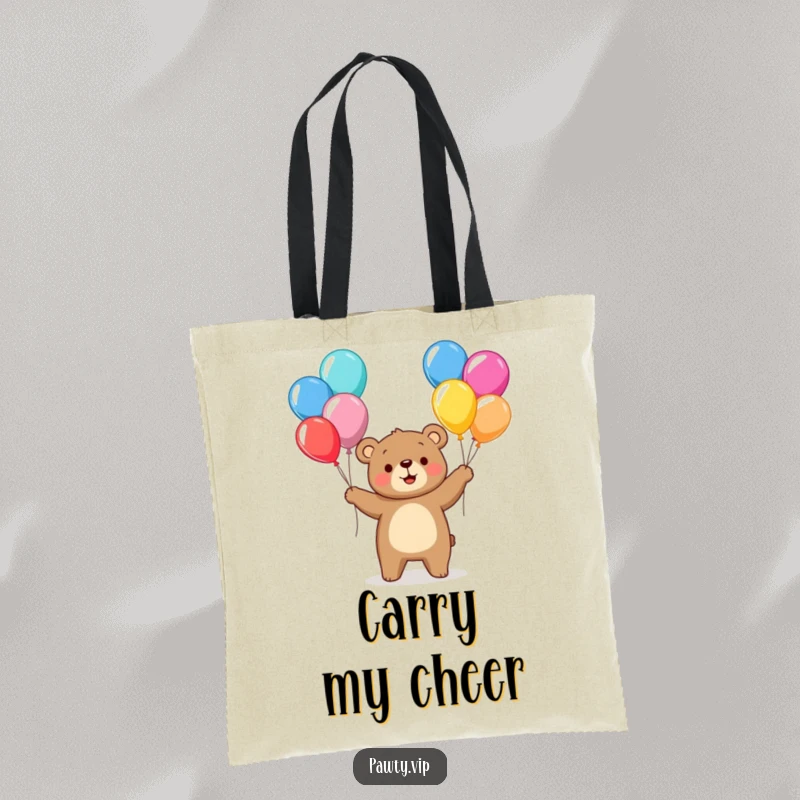 Funny bear character juggling colorful balloons on a tote bag, ideal for carrying essentials with a cheerful, festive touch.